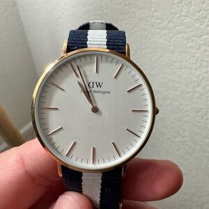Daniel Wellington Gold and Black Watch with White Stripe